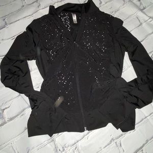 Black athletic jacket with laser cutouts